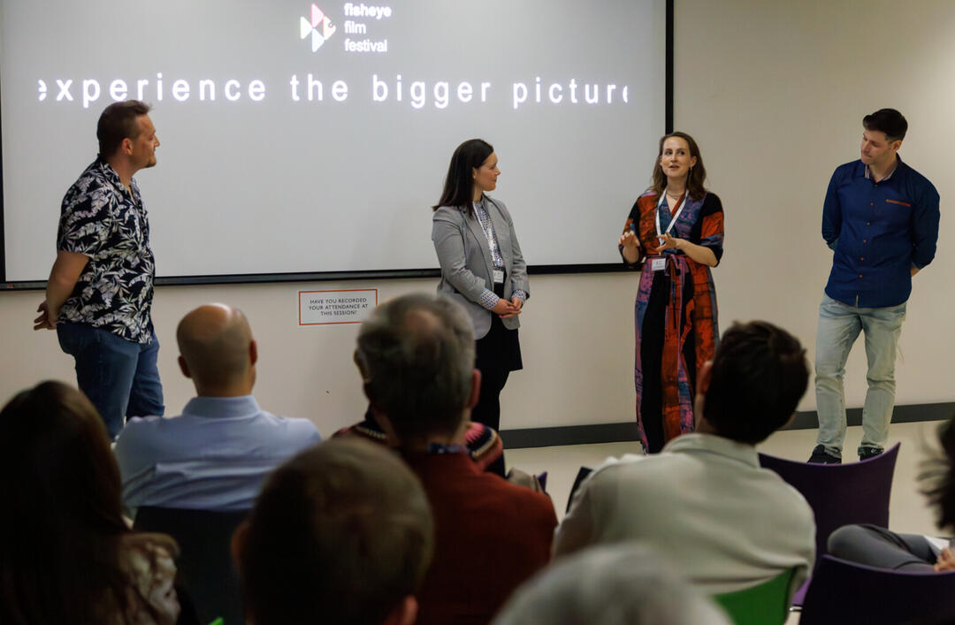 Filmmakers discussing their short films at the Fisheye Film Festival on April 18, 2024!